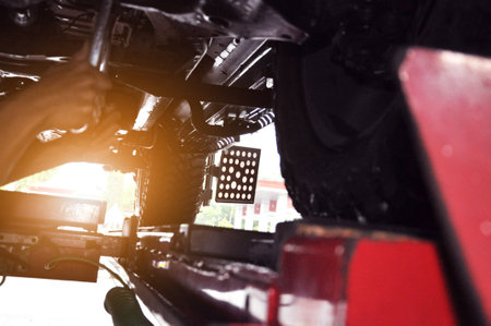 Target of the car wheel angle adjustment equipment fixed on a car wheelのeditorial素材