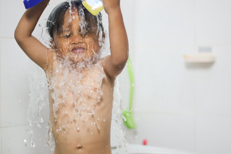 3 years old Asian little boy bathing at homeの写真素材