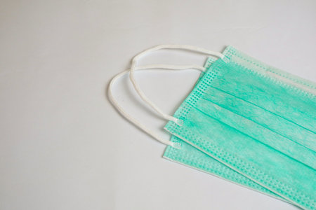 Medical mask or surgical earloop mask isolated on white background with clipping path. Medical mask...
