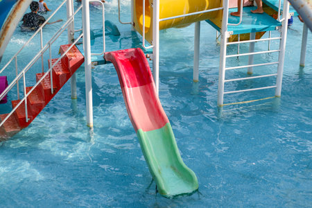 Colorful slides in water park. Summer vacation