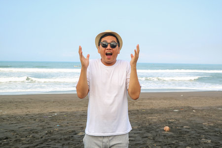 Asian men posing surprisedの写真素材