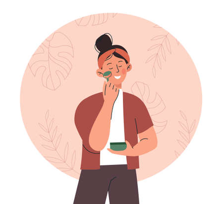Woman using jade rollerのイラスト素材