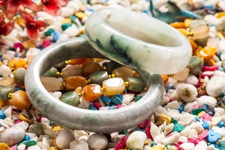 jade bracelet on stone background.の写真素材