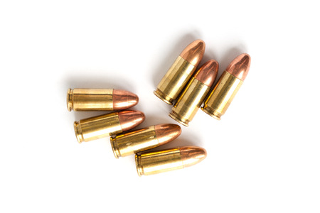9mm bullet for a gun isolated on white background.の写真素材