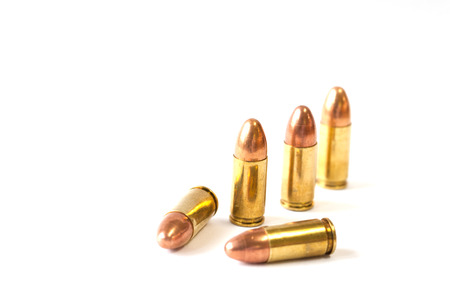 9mm bullet for a gun isolated on white background.の写真素材