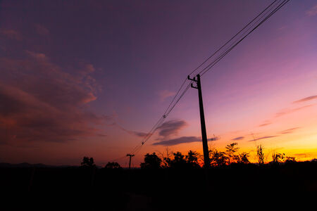 silhouette electricity post with sky cloud.の写真素材