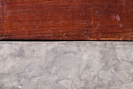 texture of old wood and Cement wall background.の写真素材
