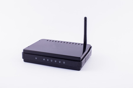 Black Wireless Router isolated on white background.の写真素材