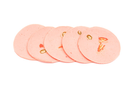 ham sausage or rolled bologna slices isolated on white background.の写真素材