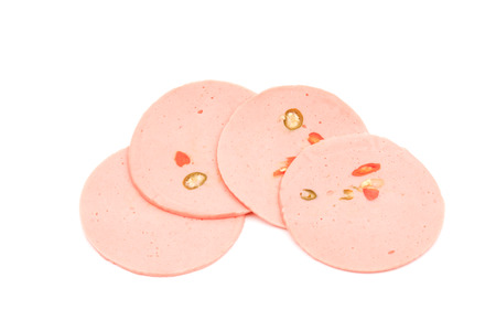 ham sausage or rolled bologna slices isolated on white background.の写真素材