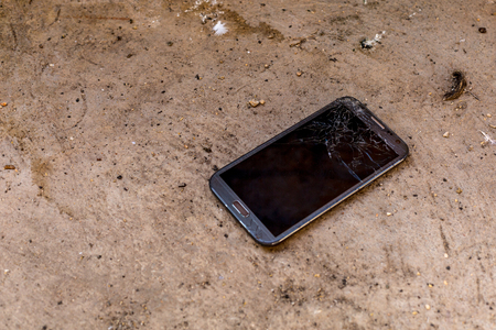 Smartphone drop to the floor and screen damage broken.の写真素材