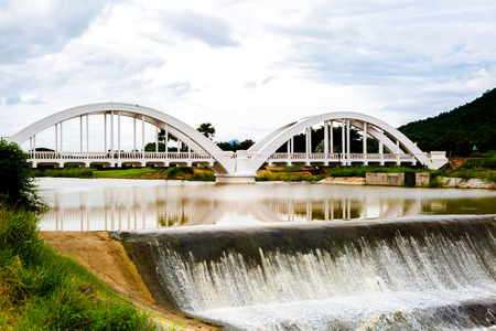Old white concrete railway bridge before world war2 at Lamphun, Thailand.の写真素材