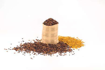Riceberry in a  in small hemp sacks isolated on white background, healthy diet conceptの写真素材