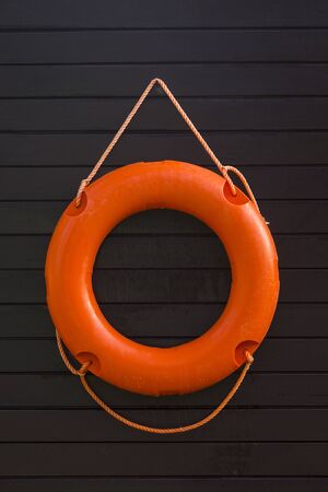 buoy on wood backgroundの写真素材