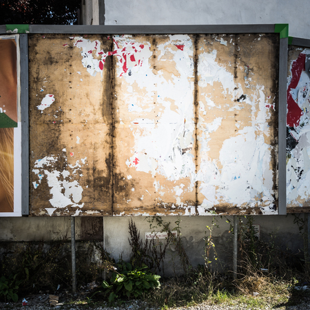 Old wooden billboard with metal frameの写真素材