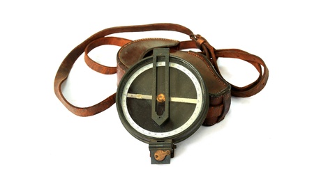 Vintage compass over a white background