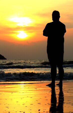 man standing in sunの写真素材