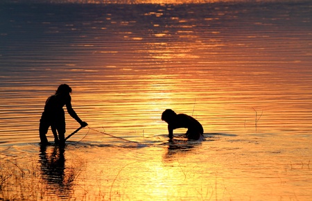fishing net on sunsetの写真素材