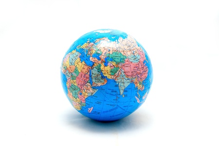 Small globe and shadow isolated on white backgroundの写真素材