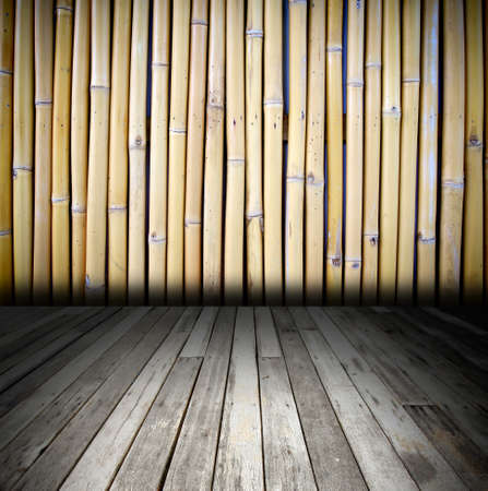 bamboo wall with wooden floor in dark room styleの写真素材