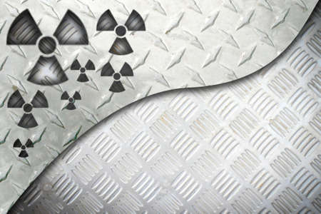 Grunge metal plate with a nuclearの写真素材