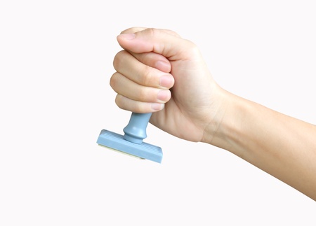 Hand and stamp on white backgroundの写真素材