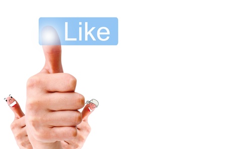 Hand pressing Like button