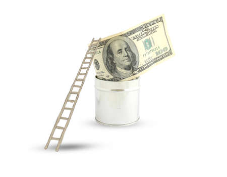 dollars with a ladder on white backgroundの写真素材