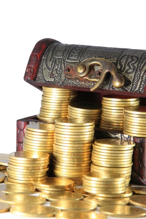 A wooden ancient chest full of moneyの写真素材