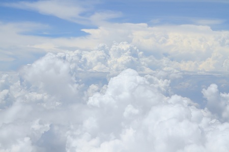 Airplane above clouds