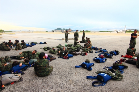 Sattaheep - SEPTEPBER 12: Thai navy parachute team prepare for jump for show in Sunset parade on...