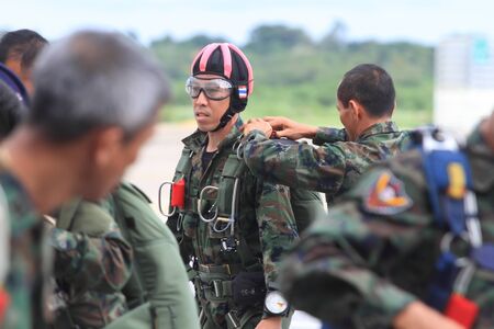 Sattaheep - SEPTEPBER 12: Thai navy parachute team prepare for jump for show in Sunset parade on...