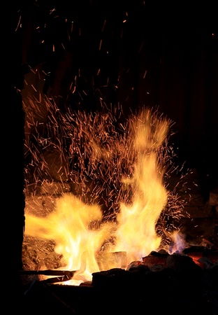 forge fire in blacksmith's where iron tools are craftedの写真素材