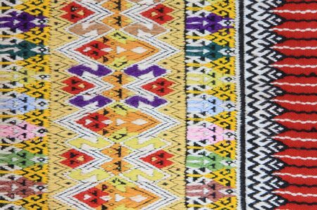 Closeup texture of thai style fabric weave hand-wovenの写真素材