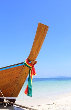 long tail boat sit on the beach,Lipe island, Thailandの写真素材