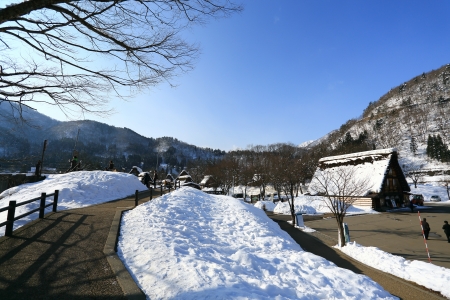 SHIRAKAWA, JAPAN - JANUARY 18  Tourists visit old village on JANUARY 18, 2014 in Shirakawa-go, Japan  Shirakawa is one of most popular attractions in Japan, listed as UNESCO World Heritage Site since 1995のeditorial素材