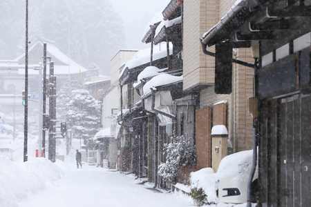 TAKAYAMA, JAPAN - JANUARY 19  A snowy day in takayama city especially in its beautifully preserved old town on JANUARY 19, 2014 in Takayama, Japan のeditorial素材