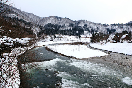 River at Gassho-zukuri Village/Shirakawagoの写真素材