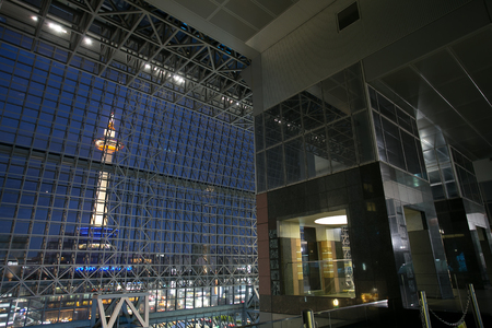 KYOTO, JAPAN - January 14, 2014: Kyoto Station is Japan's 2nd largest train station and its futurism architecture opened amid controversy in 1997 in the otherwise historical cityのeditorial素材