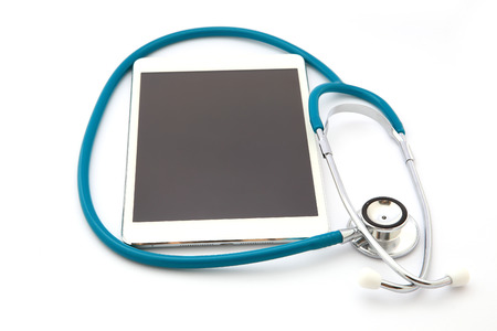 Tablet Computer With Stethoscope, Isolated On White Backgroundの写真素材