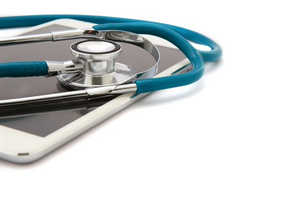 Tablet Computer With Stethoscope, Isolated On White Backgroundの写真素材