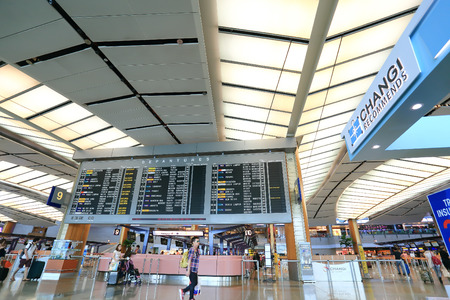 SINGAPORE - MAY 13 : Check in counters at Changi International Airport on May 13, 2014 in Singapore. Changi Airport serves more than 100 airlines operating 6,100 weekly flightsのeditorial素材