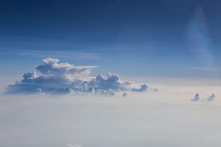 clouds and blue sky seen from plane