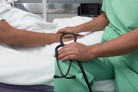 medical doctor holing senior patientの写真素材