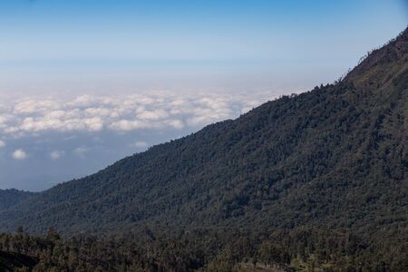 View from the tropical forest with path to the volcano Kawah Ijen, East Java, Indoneisaの写真素材