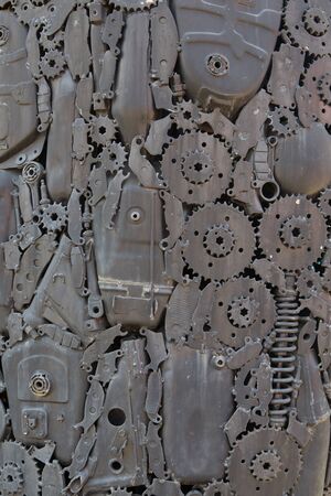 handicraft metal artwork from used spare parts backgroundの写真素材