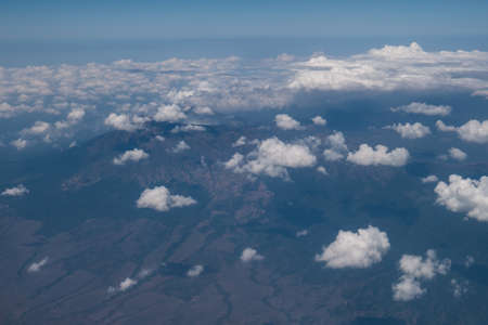 Bali island in tropical sea, veiw from airplane sight