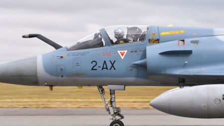Evreux Airport France JULY, 14, 2019 Closeup view of the pilot of a military fighter jet in the cockpit. Dassault Mirage 2000-5F of French Air Forceのeditorial素材