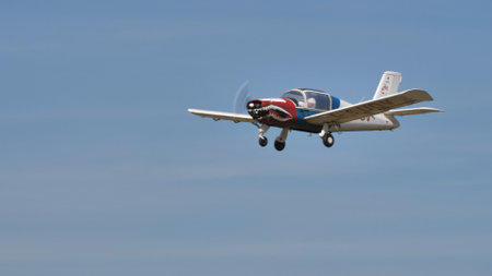 Ferrara Italy JUNE, 27, 2021 Vintage general aviation turistic private airplane in flight in blue...