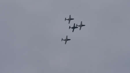 Zeltweg, Austria SEPTEMBER, 6, 2019 Four military airplanes in flight in formation in cloudy sky....